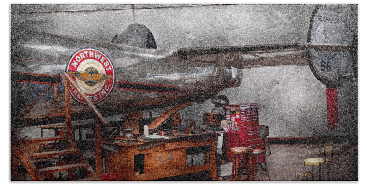 Plane Beach Towel featuring the photograph Airplane - The repair hanger by Mike Savad