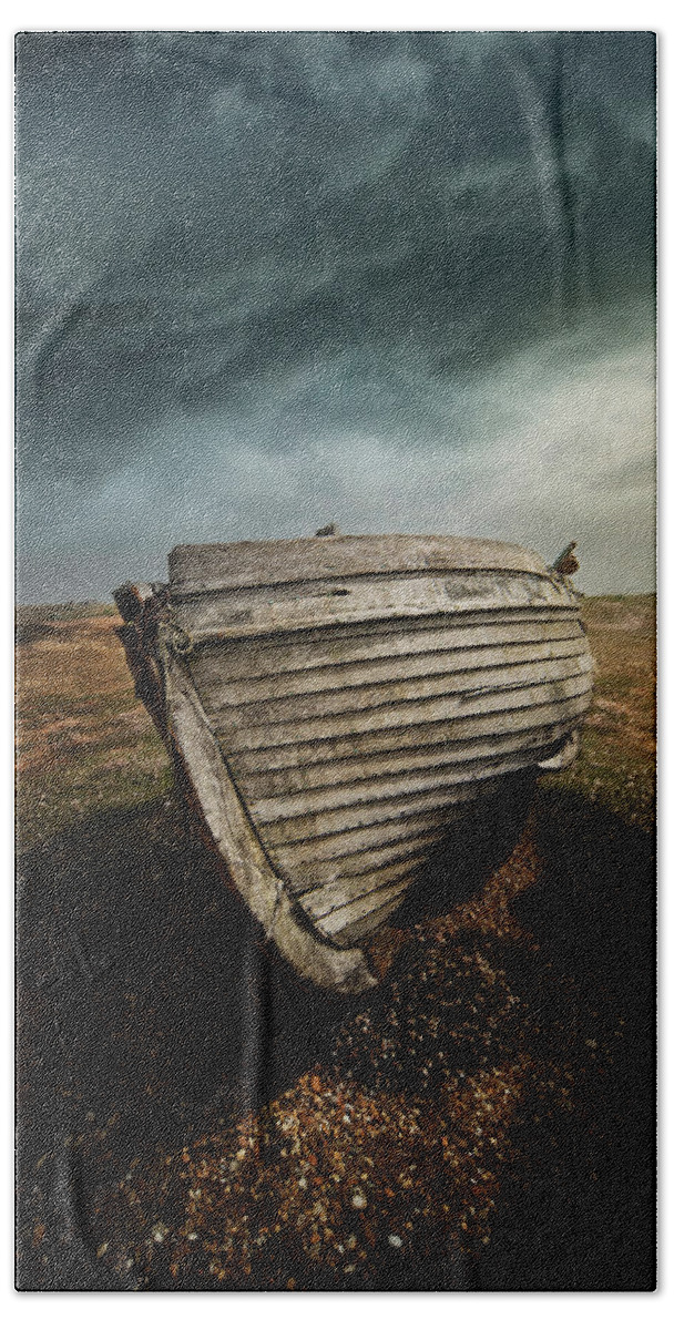 Boat Beach Sheet featuring the photograph An old wreck on the field. Dramatic sky in the background by Jaroslaw Blaminsky