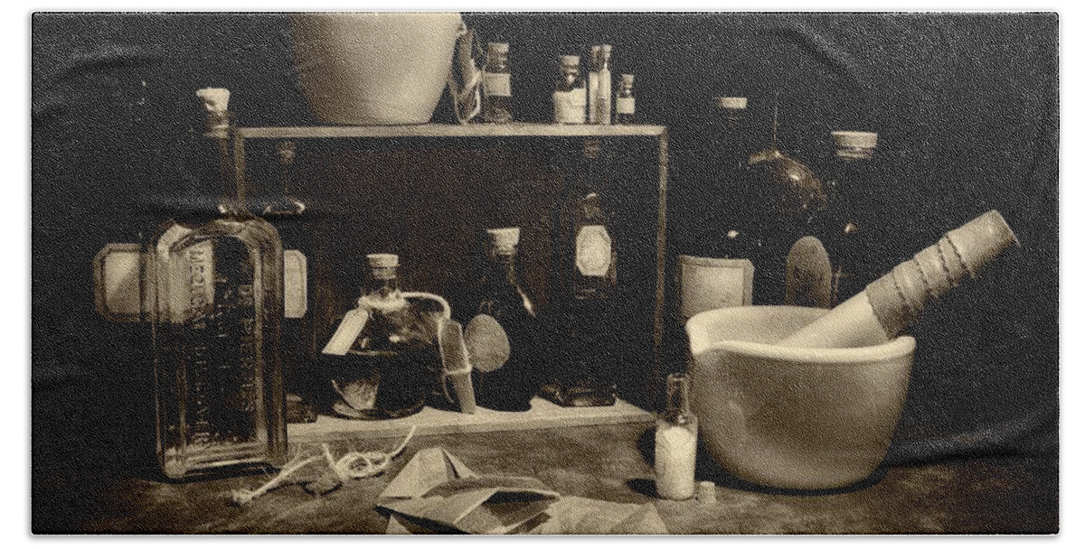 Glassware Beach Towel featuring the photograph Apothecary sepia by Mark Fuller