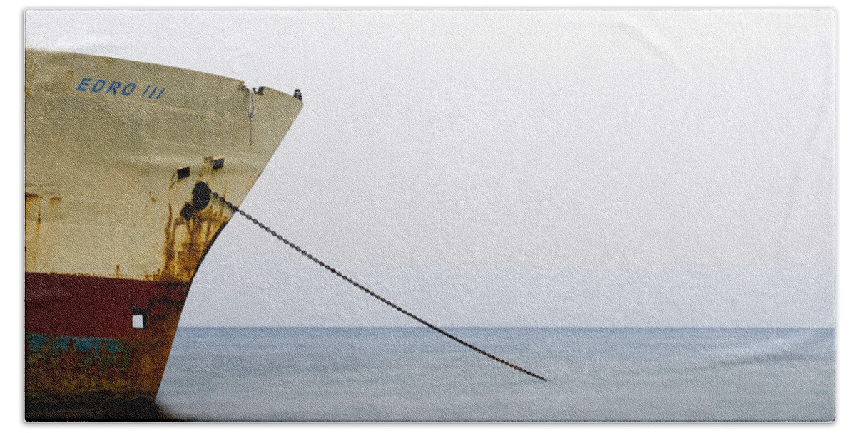Seascape Beach Towel featuring the photograph Abandoned ship on the ocean by Michalakis Ppalis