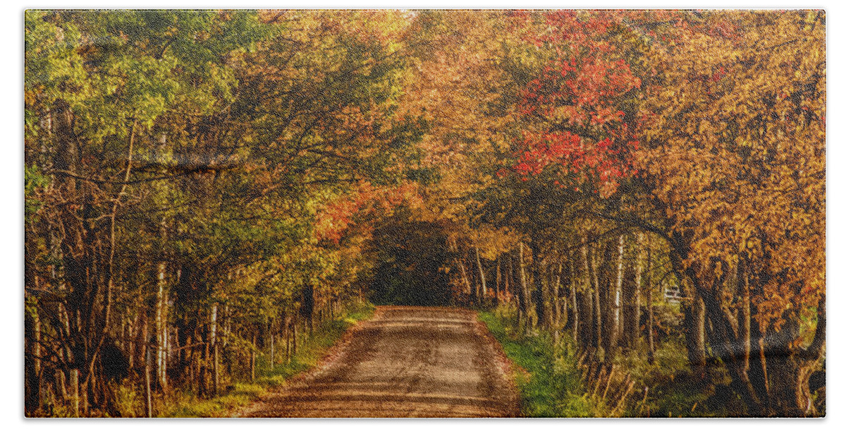 Peacham Vermont Beach Towel featuring the photograph Fall color along a dirt backroad by Jeff Folger