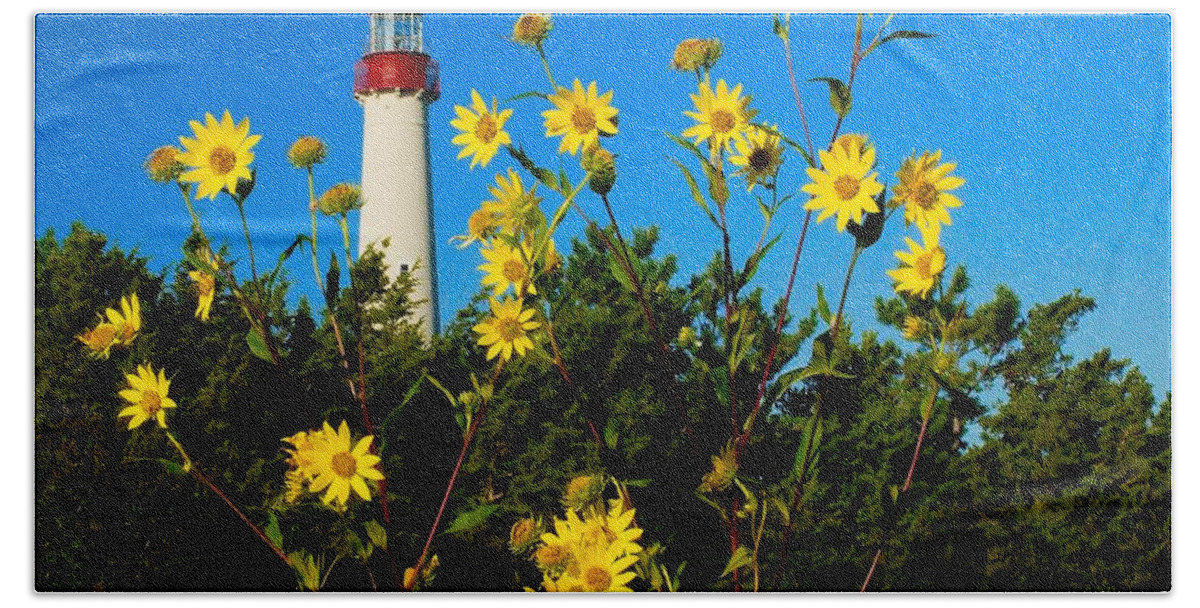 Lighthouse Beach Towel featuring the photograph Fall Flowers at the Light by Nick Zelinsky Jr