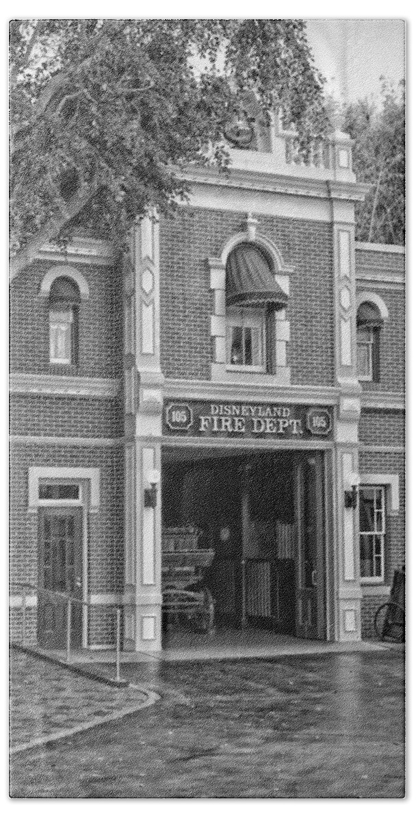 Main Street Beach Towel featuring the photograph Fire Station Main Street Disneyland BW by Thomas Woolworth