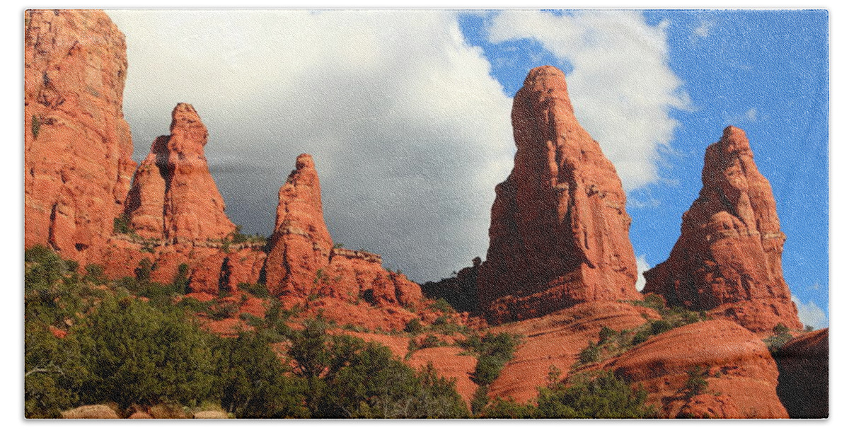 Red Rock Beach Towel featuring the photograph Four Braves by Roupen Baker