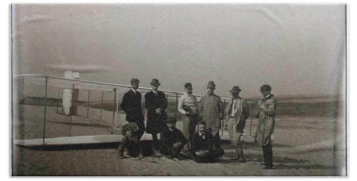The Beach Towel featuring the photograph The Wright Brothers Group portrait in front of glider at Kill Devil Hill by Vintage Collectables