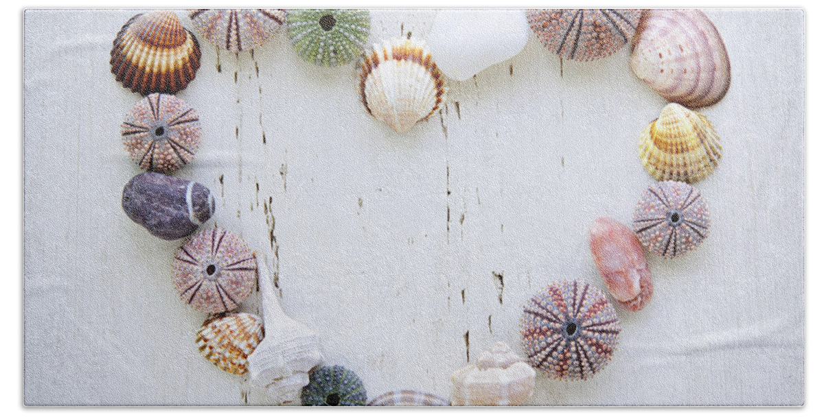 Heart Beach Sheet featuring the photograph Heart of seashells and rocks by Elena Elisseeva