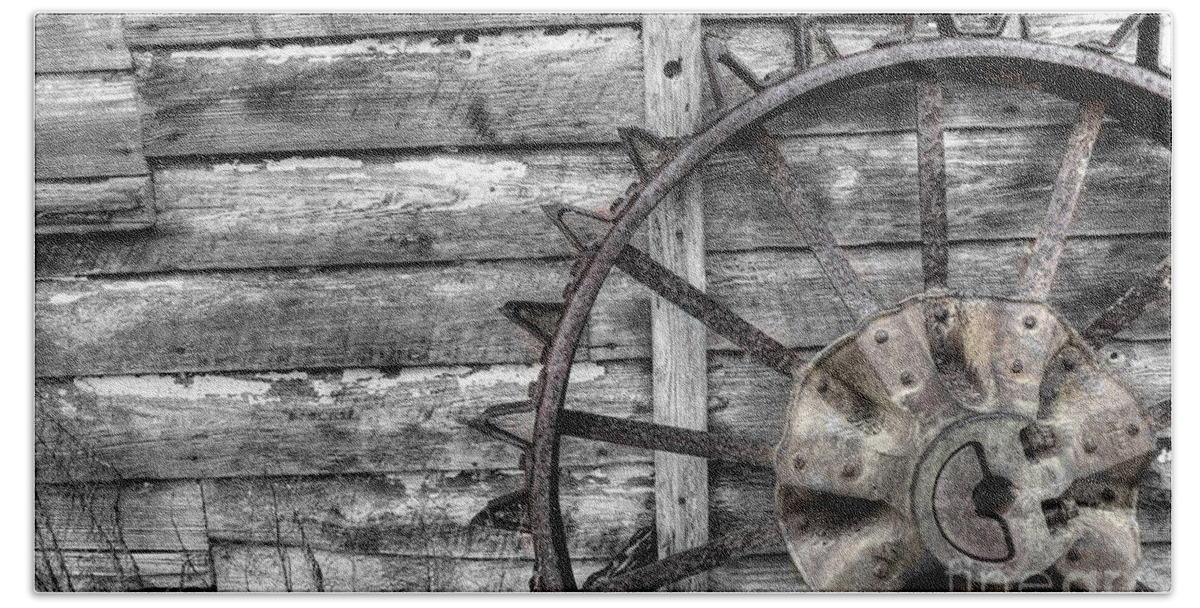 Coosaw Beach Towel featuring the photograph Iron Tractor Wheel by Scott Hansen