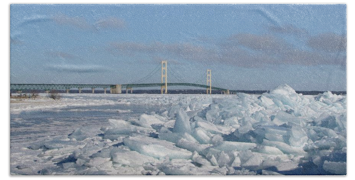 Ice Windrow Beach Towel featuring the photograph Mackinac Bridge with ice windrow by Keith Stokes