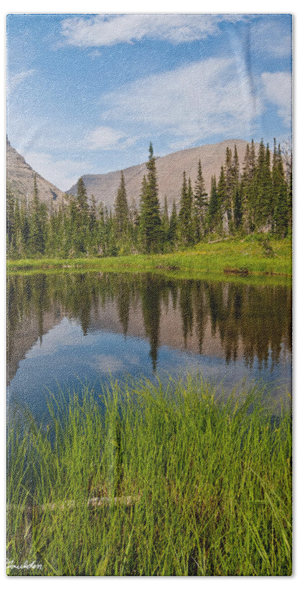 Beauty In Nature Beach Towel featuring the photograph Mountains Reflected in an Alpine Lake by Jeff Goulden