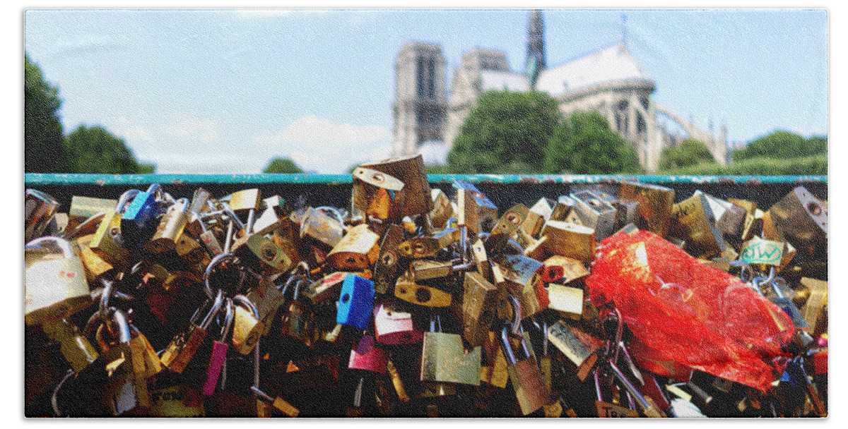 Paris Beach Towel featuring the photograph Paris pont des arts Love Locks with Notre Dame in the background by Toby McGuire