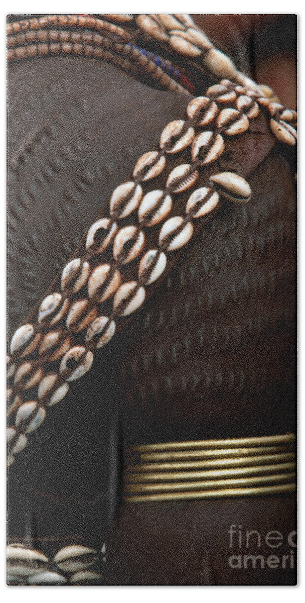 Vertical Beach Towel featuring the photograph Person Showing Cowry Shell Detail by Art Wolfe