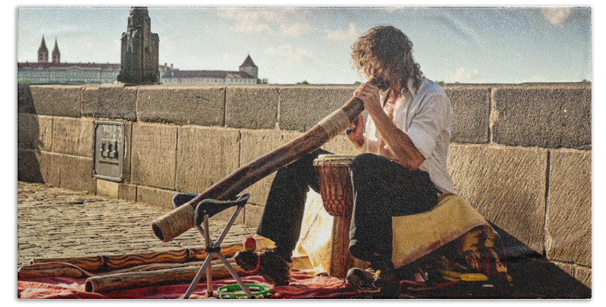 Playing Didgeridoo on the Charles Bridge. Prague Beach Towel