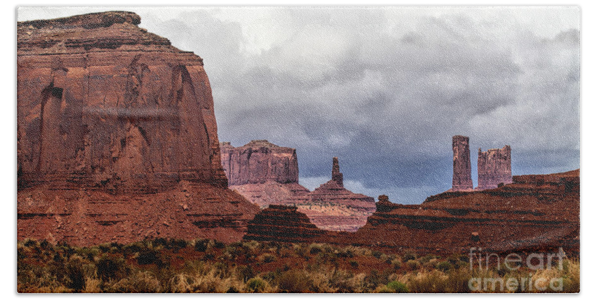 Monument Valley Beach Towel featuring the photograph Rain Over the Monuments by Jim Garrison