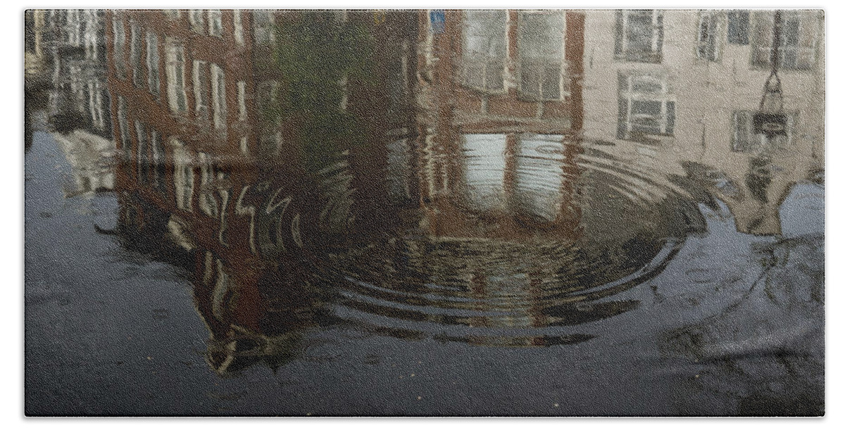 Raindrop Beach Towel featuring the photograph Raindrops Ripples and Fabulous Reflected Amsterdam Canal Houses by Georgia Mizuleva