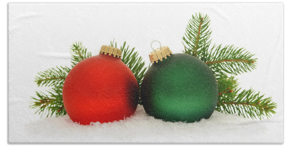 Christmas Beach Towel featuring the photograph Red and green Christmas baubles by Elena Elisseeva