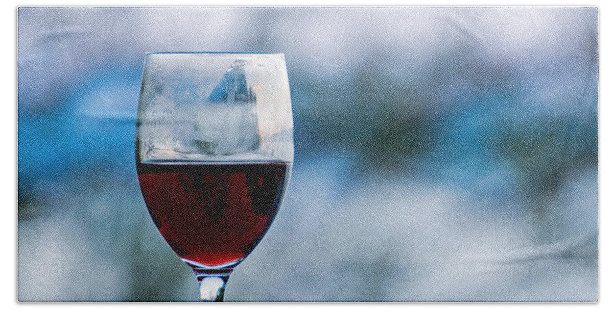 Red Beach Towel featuring the photograph Single Glass of Red WIne on Blue and White Background by Photographic Arts And Design Studio