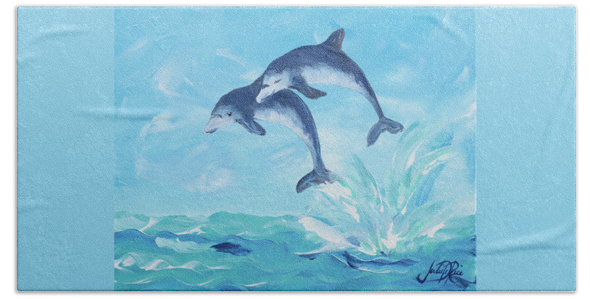 Soaring Beach Towel featuring the digital art Soaring Dolphins I by Julie Derice