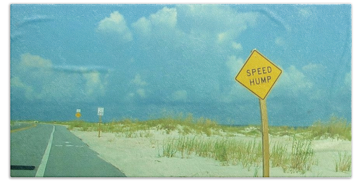 Street Sign Beach Sheet featuring the photograph Speed Hump by Deborah Lacoste
