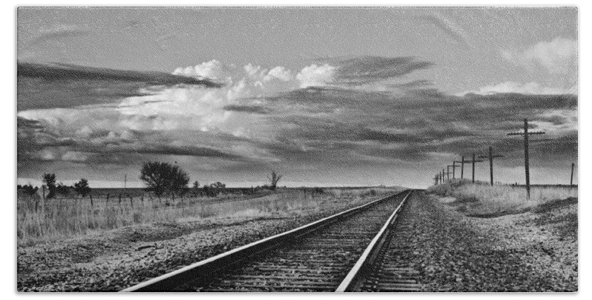 Black And White Beach Towel featuring the photograph Storm Cloud above Rail Road Tracks by Eric Benjamin