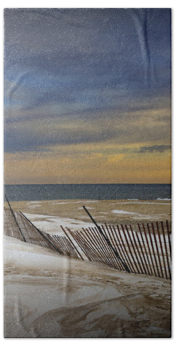 Michigan Beach Towel featuring the photograph Sunset by the Beach at Grand Haven Michigan during Winter by Randall Nyhof