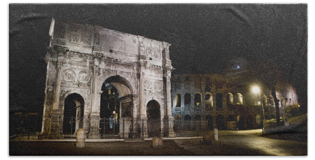 Rome Beach Towel featuring the photograph The Arch of Constantine and the Colosseum at night by Weston Westmoreland
