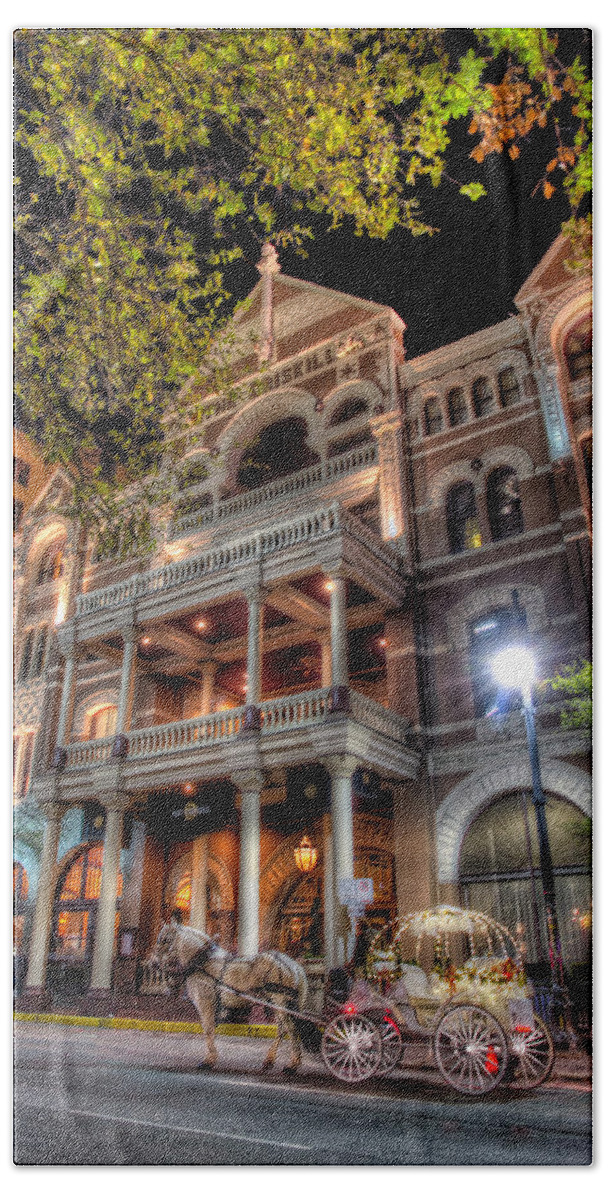 Austin Beach Towel featuring the photograph The Driskill Hotel by Tim Stanley