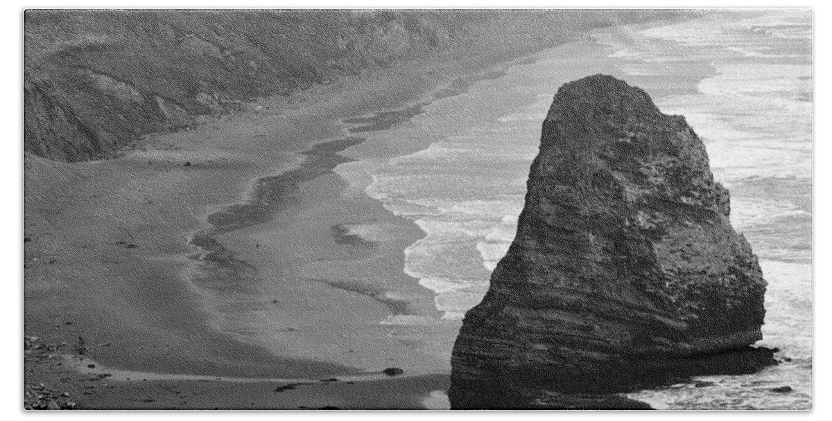 Beach Photographs Beach Towel featuring the photograph Towering Rock by Kirt Tisdale