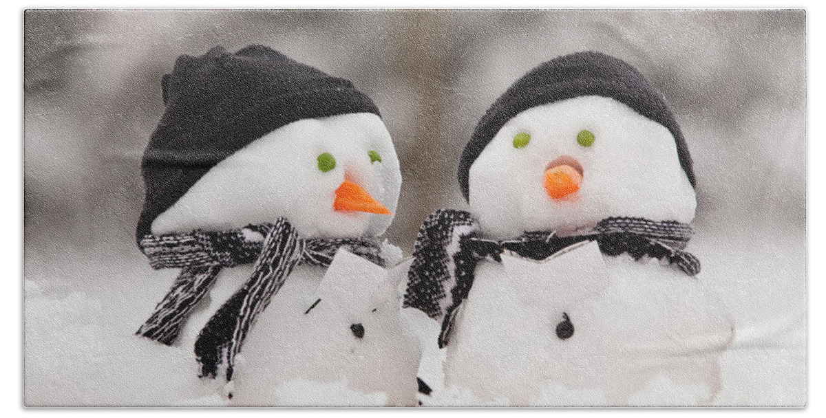 Snowmen Beach Towel featuring the photograph Two little snowmen by Simon Bratt