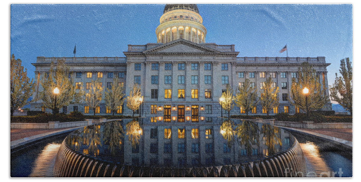 Utah State Capitol Beach Towel featuring the photograph Utah State Capitol in Reflecting Fountain at Dusk by Gary Whitton
