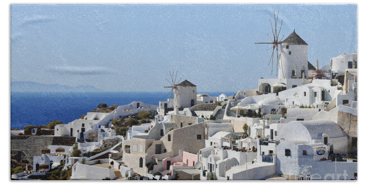 Santorini Beach Towel featuring the photograph Windmills and white houses in Oia #1 by George Atsametakis