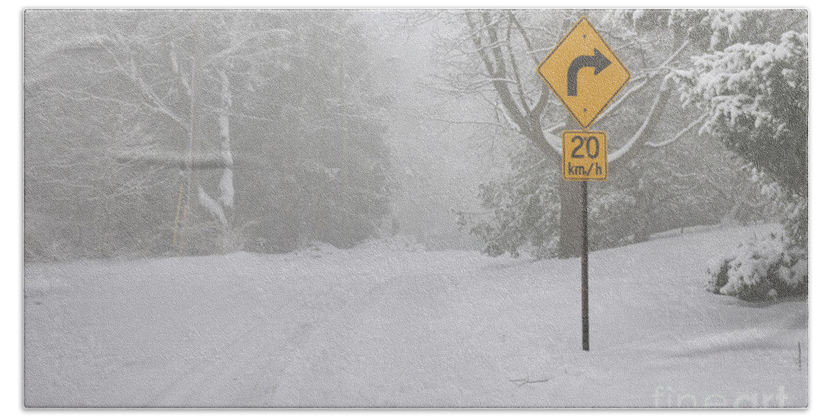 Winter Beach Towel featuring the photograph Winter road with yellow sign by Elena Elisseeva