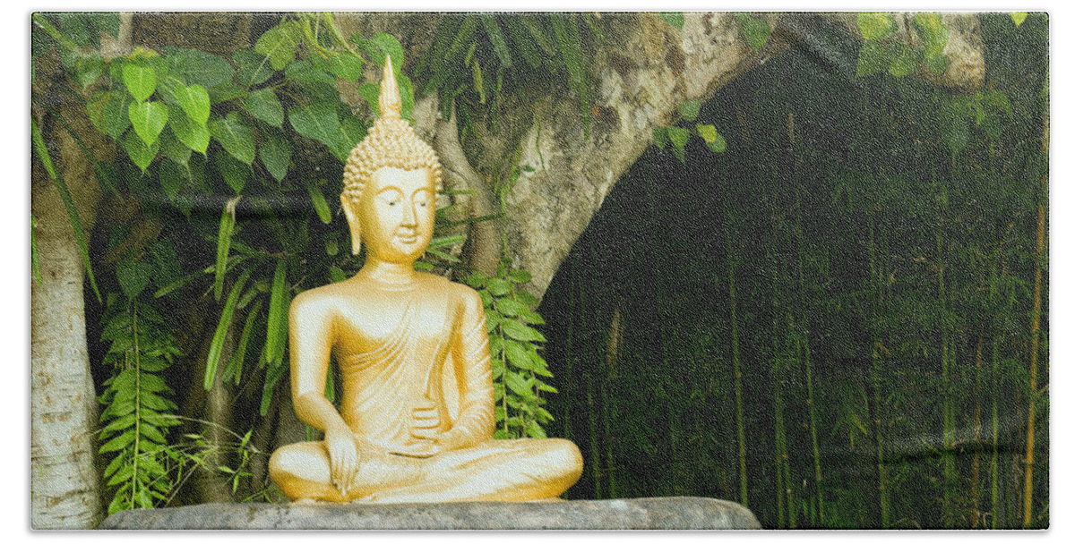 Beautiful Beach Towel featuring the photograph Buddha statue under green tree in meditative posture #1 by U Schade