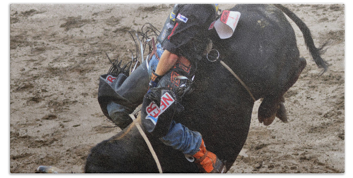 Tough Beach Towel featuring the photograph Bull Riding by Louise Heusinkveld