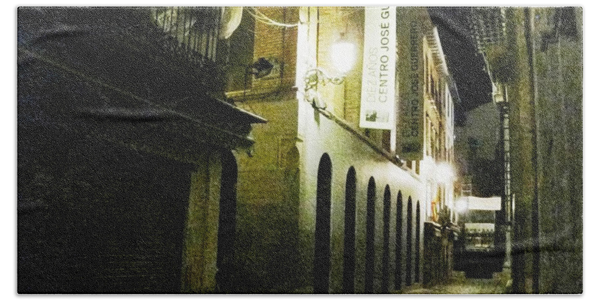 Night Beach Towel featuring the photograph Granada Stone Paved Side Street Lamp at Night by John Shiron