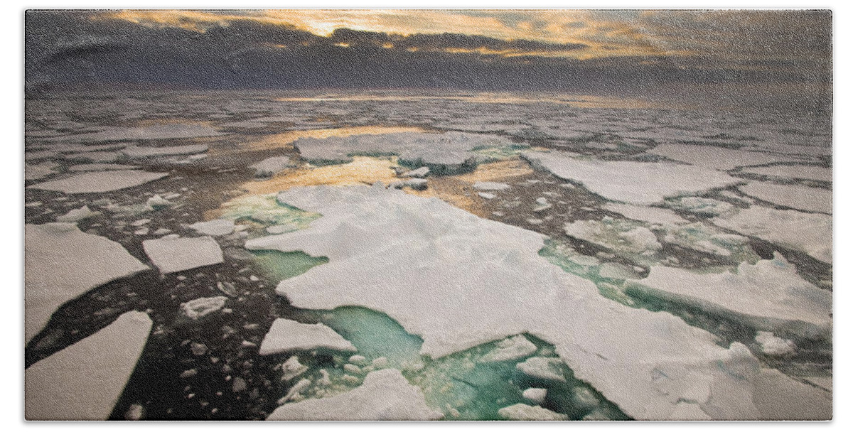 00427973 Beach Towel featuring the photograph Ice Floes At Sunset Near Mertz Glacier by Colin Monteath