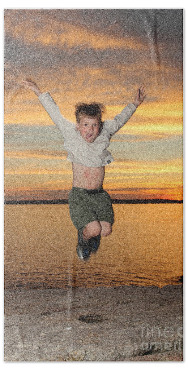 Coast Beach Towel featuring the photograph Jumping For Joy by Ted Kinsman