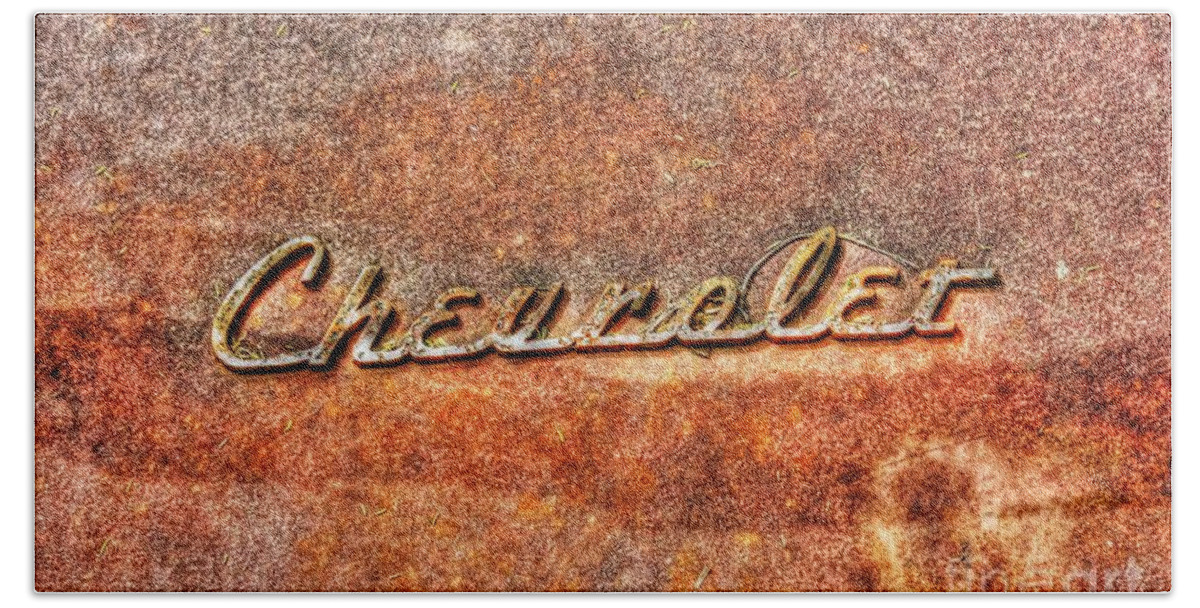 Old Beach Towel featuring the photograph Rusted Antique Chevrolet Logo by Dan Stone