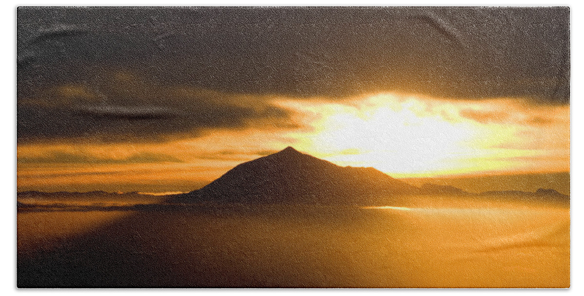 Sunrise Beach Sheet featuring the photograph sunrise behind Mount Teide by Ralf Kaiser