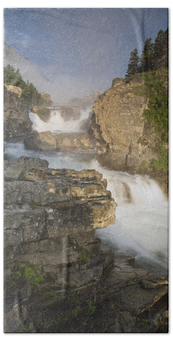 00439322 Beach Towel featuring the photograph Swiftcurrent Falls And Mount Grinnell by Sebastian Kennerknecht