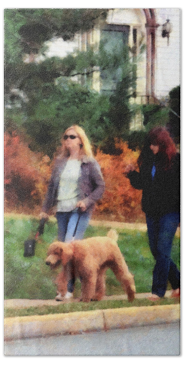 Dog Beach Towel featuring the photograph Women Walking a Dog by Susan Savad