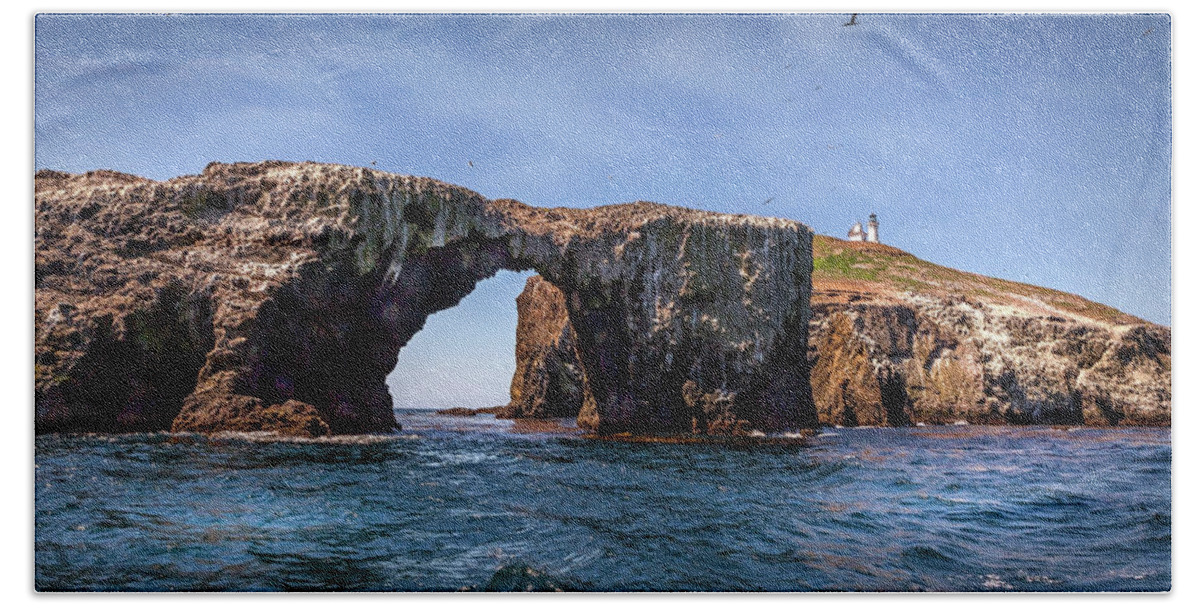 Arch Rock Beach Towel featuring the photograph Arch Rock and Lighthouse #1 by Endre Balogh