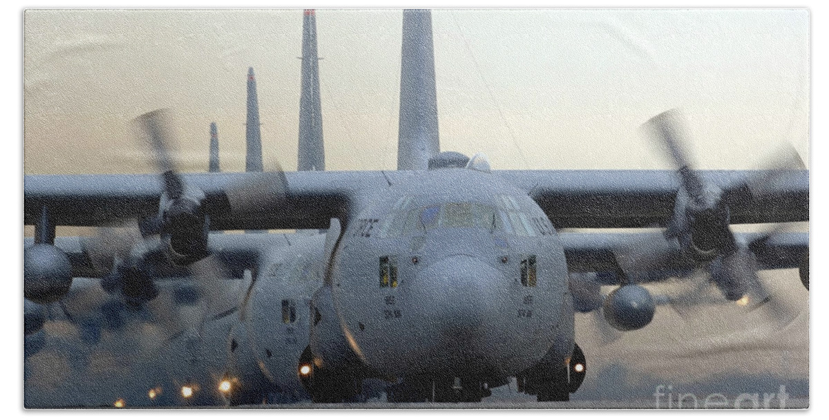 Color Image Beach Towel featuring the photograph C-130 Hercules Aircraft Taxi #1 by Stocktrek Images