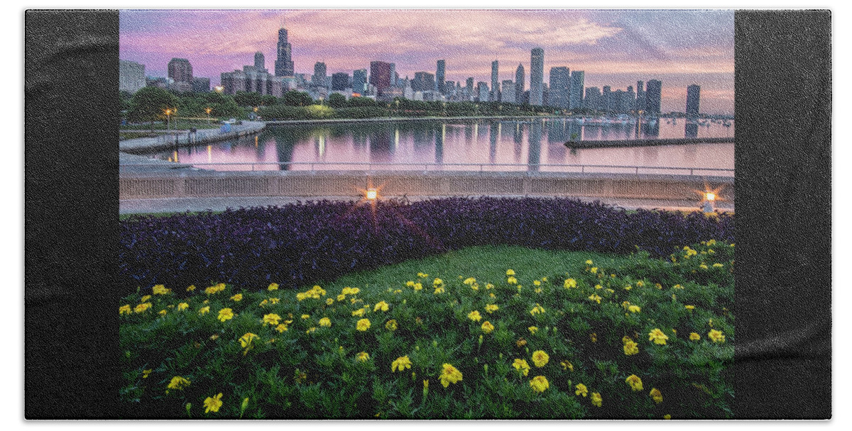 Monroe Harbor Beach Towel featuring the photograph summer flowers and Chicago skyline #1 by Sven Brogren