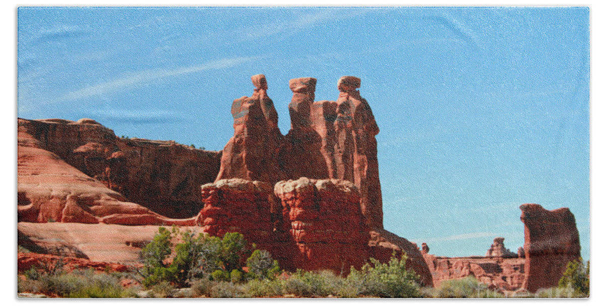 Arches National Park Beach Towel featuring the painting 3 Gossips Hoodoos Arches National Park Moab Utah by Corey Ford