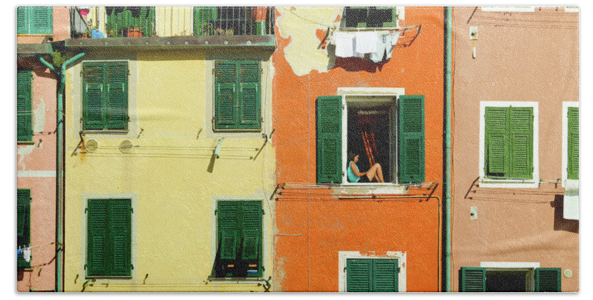 Cinque Terre Beach Towel featuring the photograph A girl on a window sill, Italy by Aashish Vaidya