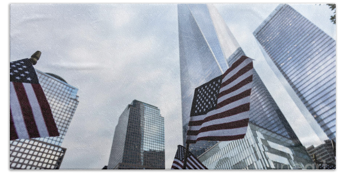America Beach Sheet featuring the photograph American flag in front of the One World World trade Center by Didier Marti