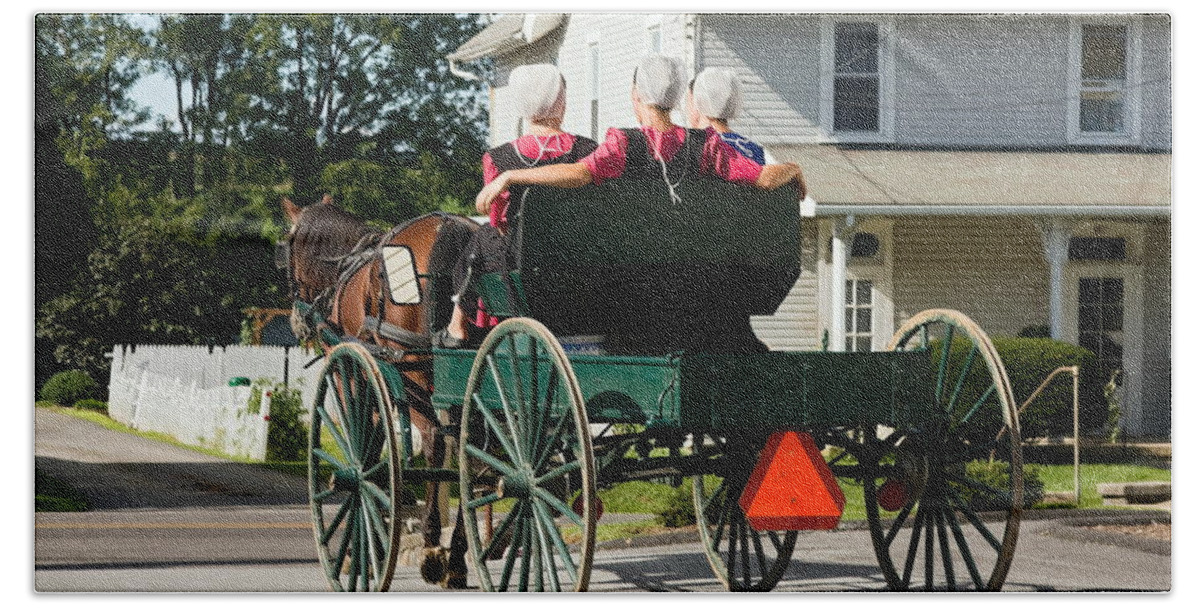 Amish Women Riding In Open Horse Drawn Cart Beach Sheet featuring the photograph Amish Women by Sally Weigand