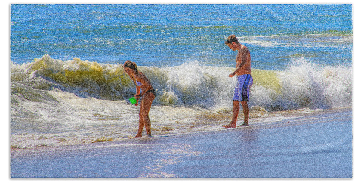 Bonnie Follett Beach Towel featuring the photograph Beach Couple at the Seashore by Bonnie Follett