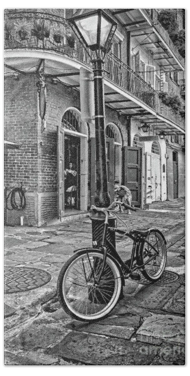 Bike Beach Towel featuring the photograph Bike and Lamppost in Pirate's Alley- BW by Kathleen K Parker