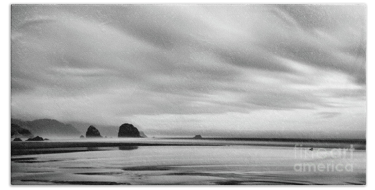 Haystack Rock Beach Towel featuring the photograph Cannon Beach long exposure sunrise in black and white by Paul Quinn